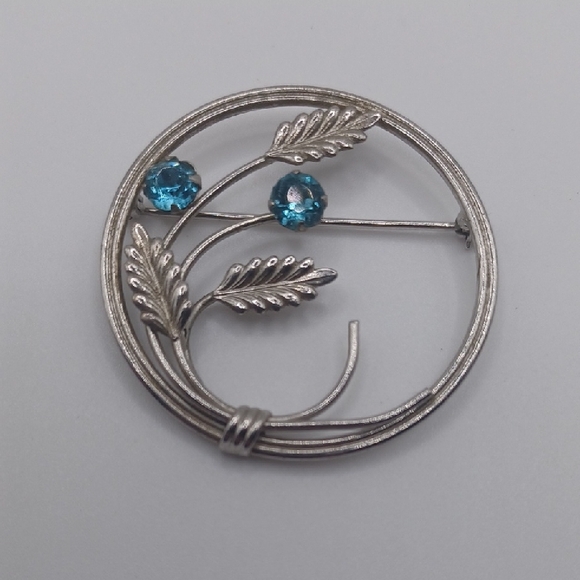 Van Dell Jewelry - Van Dell Sterling Floral Brooch With Light Blue Rhinestones